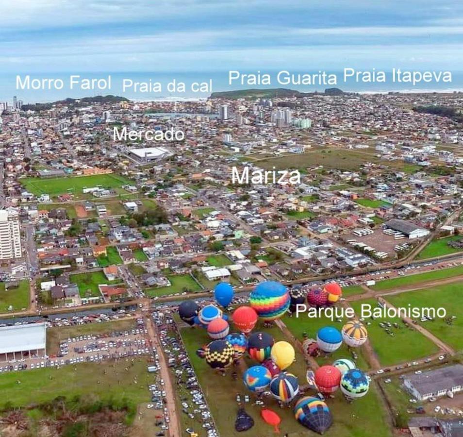 CASA completa em TORRES-RS - O MELHOR CUSTO BENEFICIO na mais bela praia Gaúcha - Cozinha - Banheiro - Ar condicionado - Smart TV 32 Android Apps Youtube - Netflix - Prime Vídeo e Wi-Fi - Estacionamento - Acomoda até 10 pessoas - Anfitriã Superhost n Torres Exterior foto