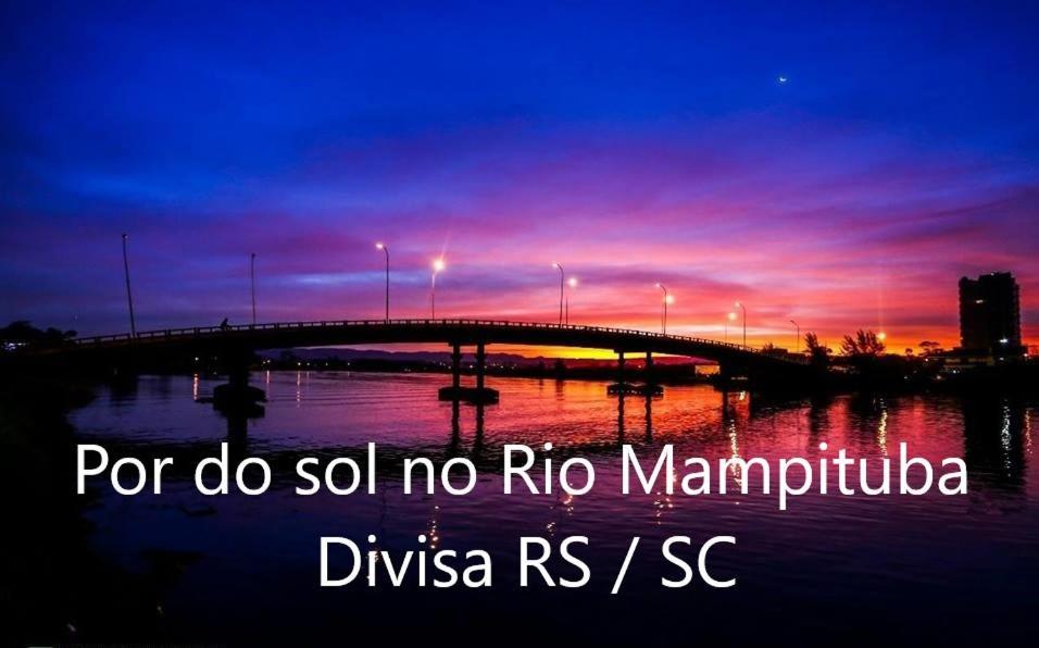 CASA completa em TORRES-RS - O MELHOR CUSTO BENEFICIO na mais bela praia Gaúcha - Cozinha - Banheiro - Ar condicionado - Smart TV 32 Android Apps Youtube - Netflix - Prime Vídeo e Wi-Fi - Estacionamento - Acomoda até 10 pessoas - Anfitriã Superhost n Torres Exterior foto